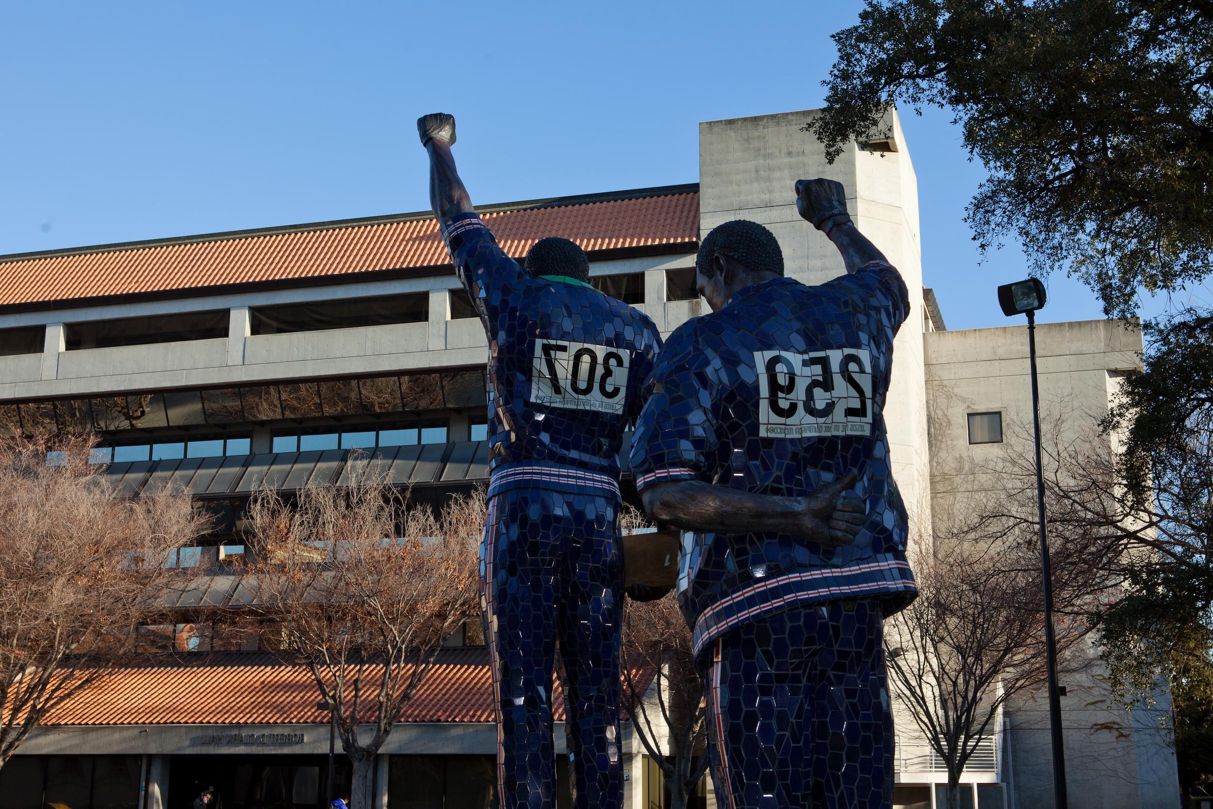 The statues outside of Clark Hall.